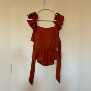 Express ruffle sleeve open back Burnt Orange summer top!